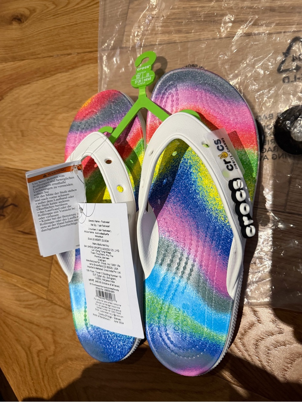 NWT Crocs Flip Flops Rainbow Multicolor Jibbitz Women’s 7 Men’s 5